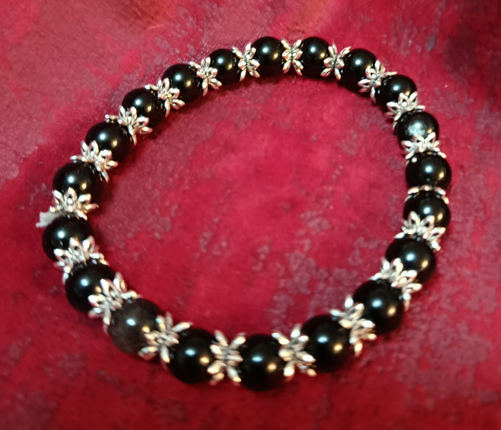 Bracelet Élégance en Onyx et Motifs Feuillage Argentés