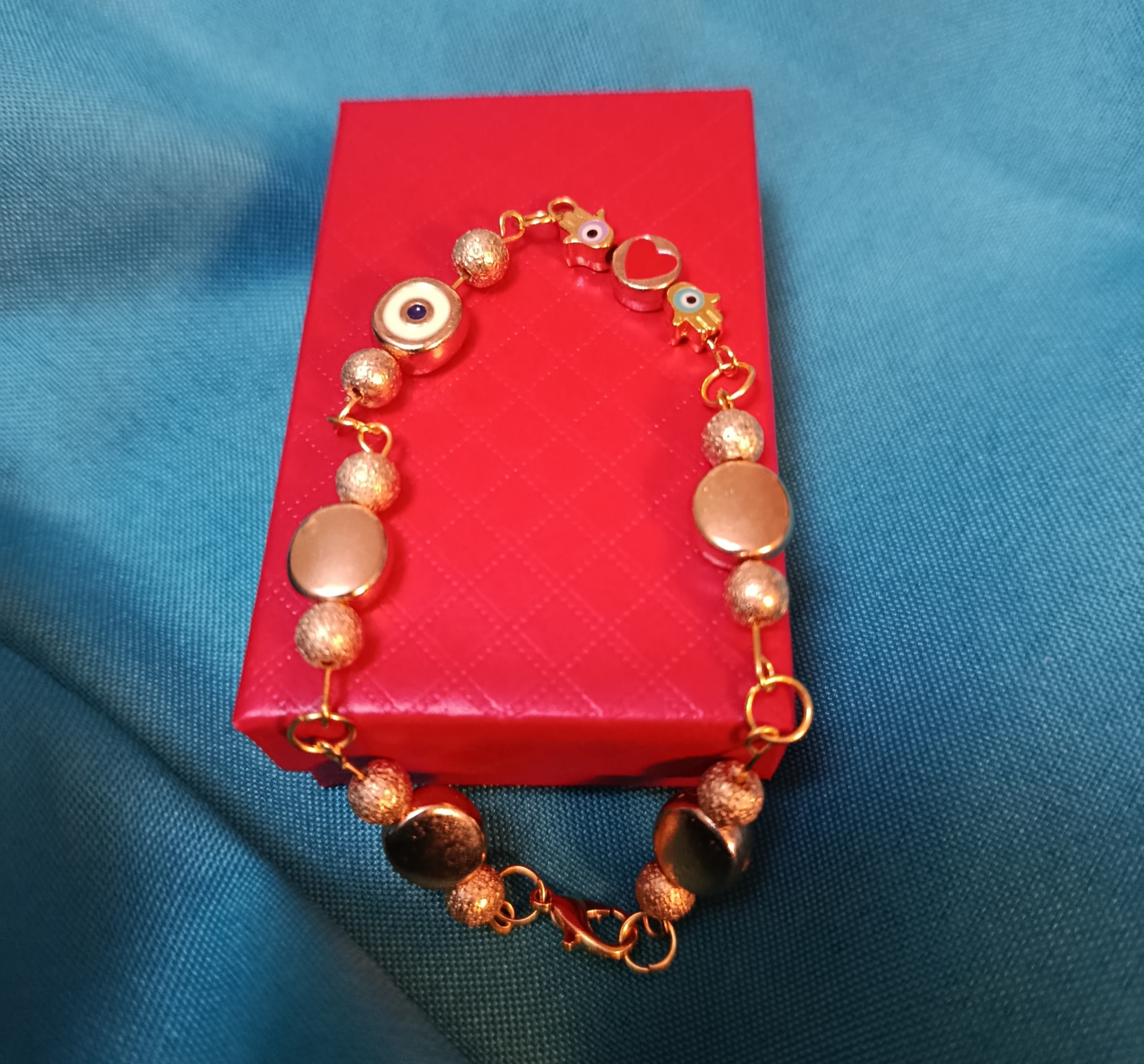 Bracelet "Talisman Protecteur" aux yeux porte-bonheur et cœur