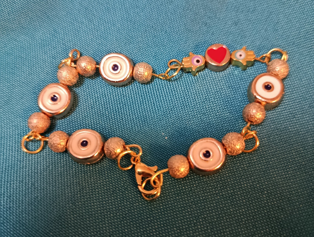 Bracelet "Talisman Protecteur" aux yeux porte-bonheur et cœur