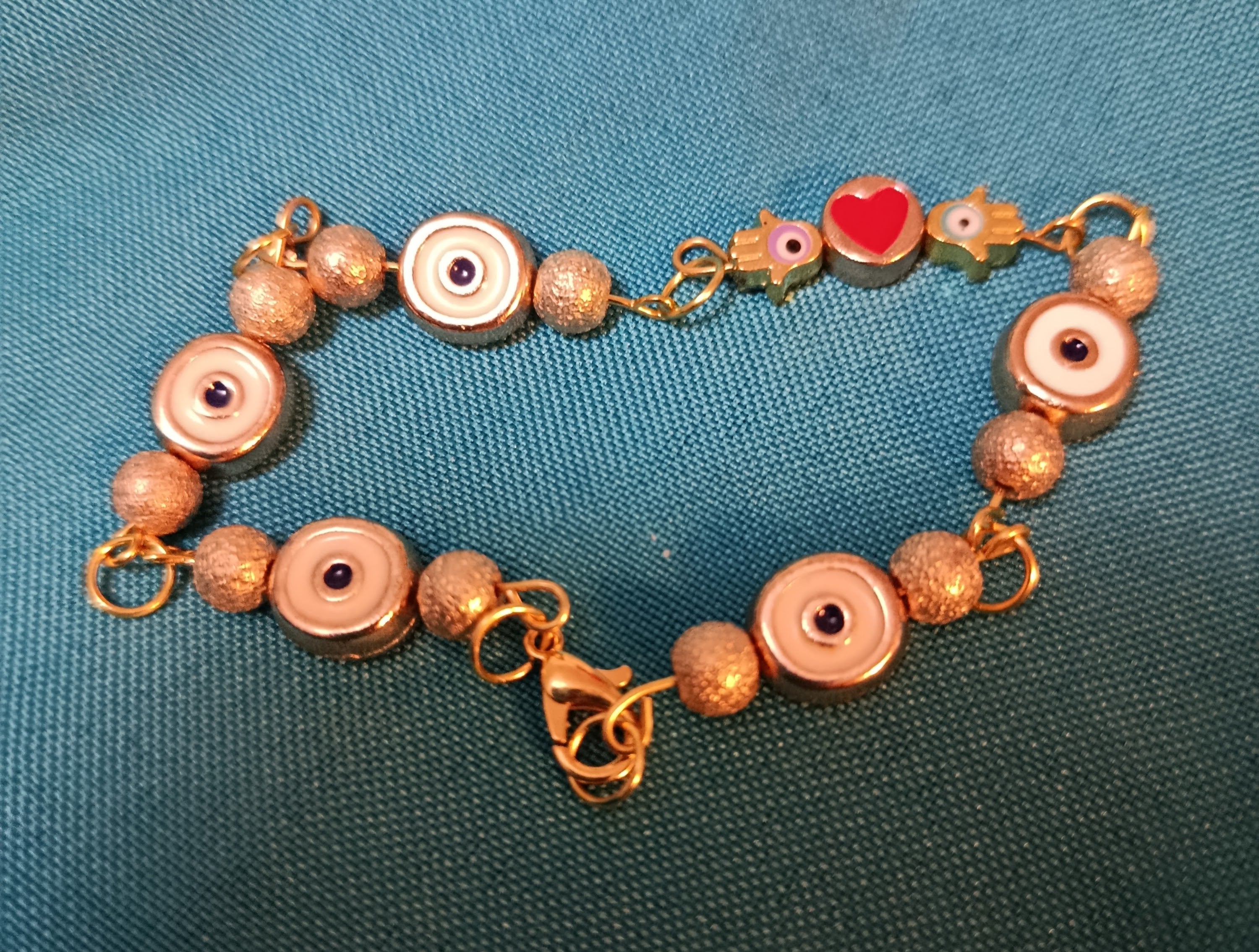 Bracelet "Talisman Protecteur" aux yeux porte-bonheur et cœur