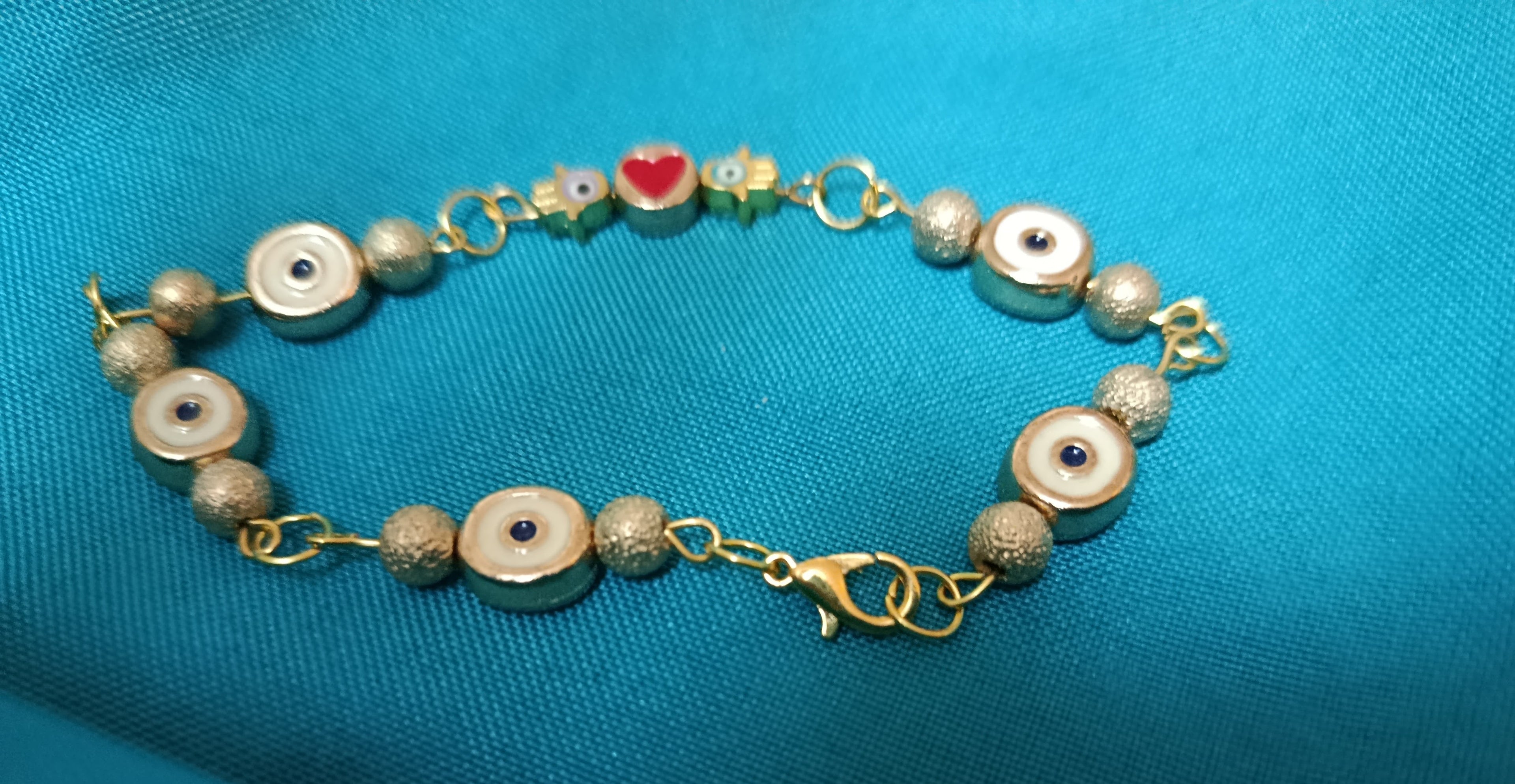 Bracelet "Talisman Protecteur" aux yeux porte-bonheur et cœur