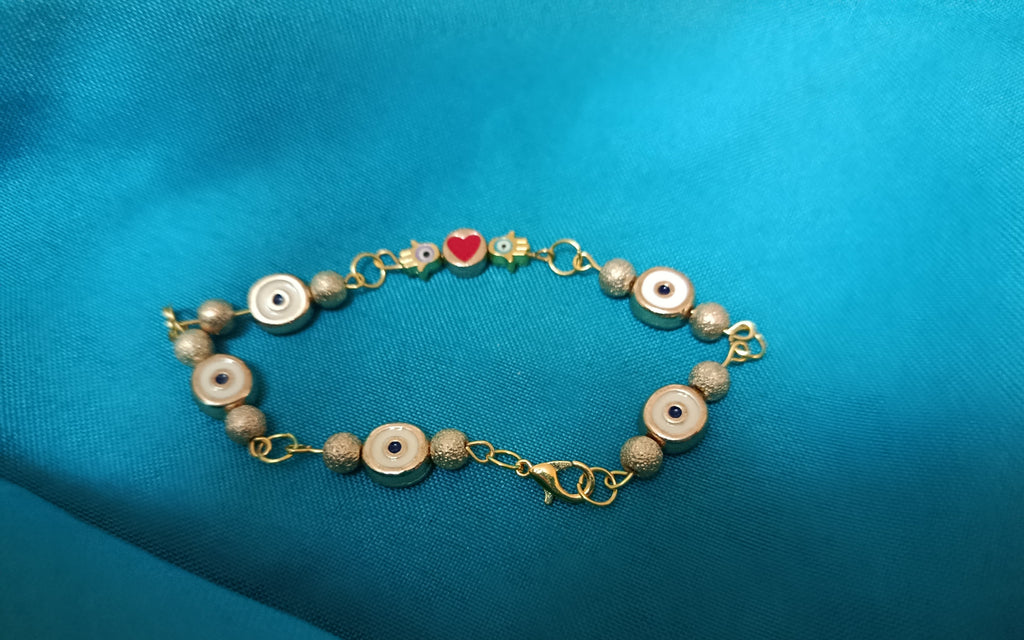 Bracelet "Talisman Protecteur" aux yeux porte-bonheur et cœur