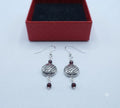 Boucles d'oreilles pendantes Poissons et perles de Grenat argenté